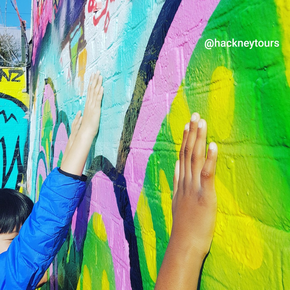 AA Kids touching wall on Young Hackney tour